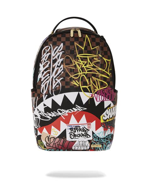 Buy Sprayground Tagged Up Sharks In Paris Dlxsv Backpack Online In