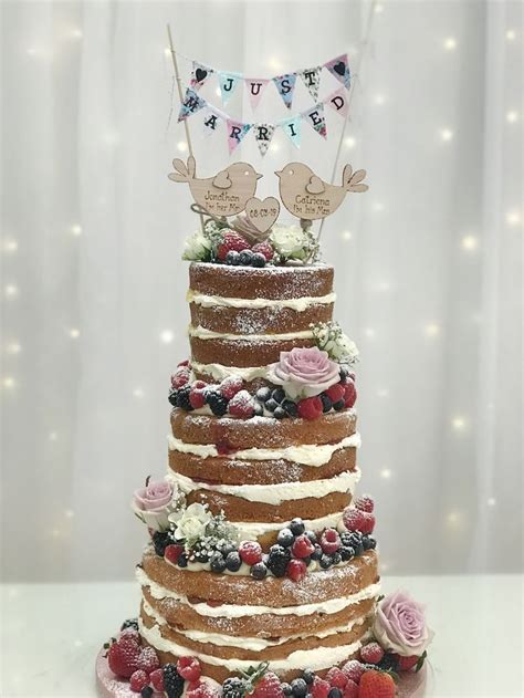 Naked Cake Filled With Luscious Buttercream And Dressed With Fresh Berries Roses Cute Toppers