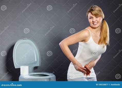 Woman Suffer From Belly Pain Holds Pills In Toilet Stock Image Image