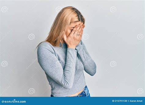 Young Caucasian Woman Wearing Casual Clothes With Sad Expression