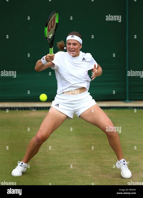 Jelena Ostapenko in action on day seven of the Wimbledon Championships ...