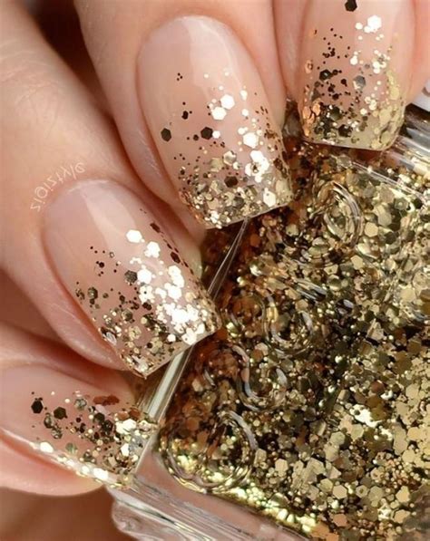 Flakes Of Gold Glitter Decorating The Tips Of Four Square Nails Nude Nails With Glitter On A