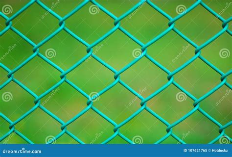 Green chainlink fence stock image. Image of mesh, chained - 107621765