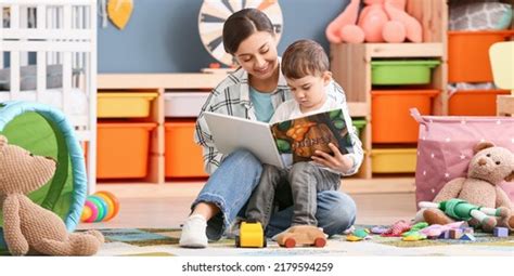 Nanny Little Boy Reading Interesting Book Stock Photo 2179594259