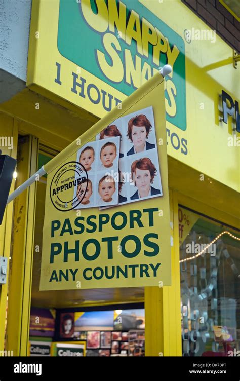 Sign Advertising Passport Photos For Any Country At A Branch Of Snappy Snaps In Kingston