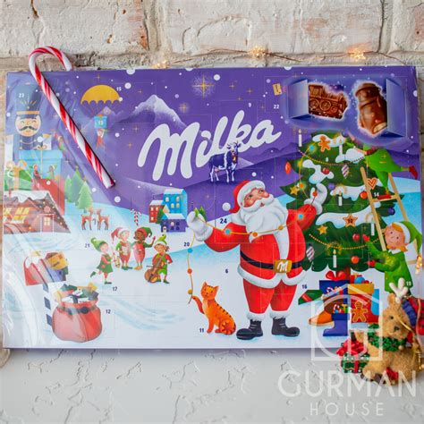 Купить Адвент календарь Milka c шоколадными фигурками и конфетами 200 г ...