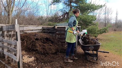 Mid March Garden Tasks Topping Raised Beds With Compost