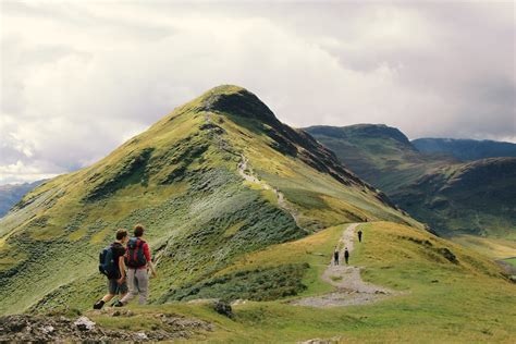 People Standing on Top of Mountain · Free Stock Photo