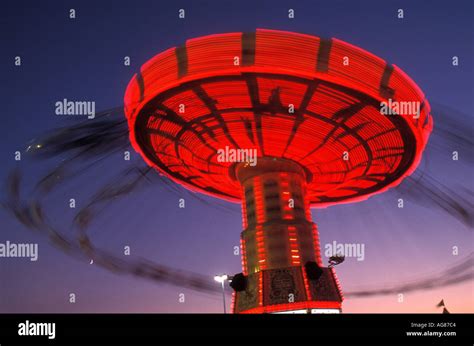 Spinning carnival ride Stock Photo - Alamy