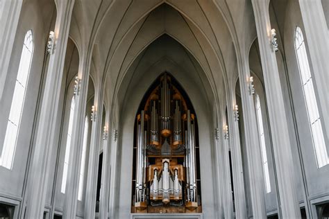 Interior of majestic Lutheran church with organ · Free Stock Photo