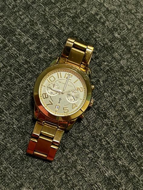 Michael kors gold watch on Carousell