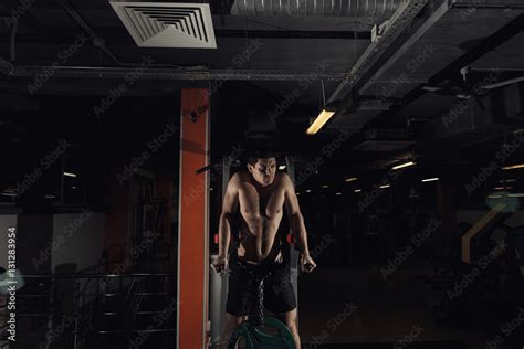 Muscular Bodybuilder Working Out In Gym Doing Exercises On Parallel Bars Athletic Male Naked