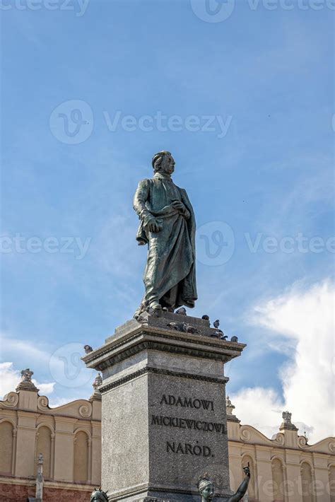 Statue Of Adam Mickiewicz In The Krakow Market Square In Poland On A