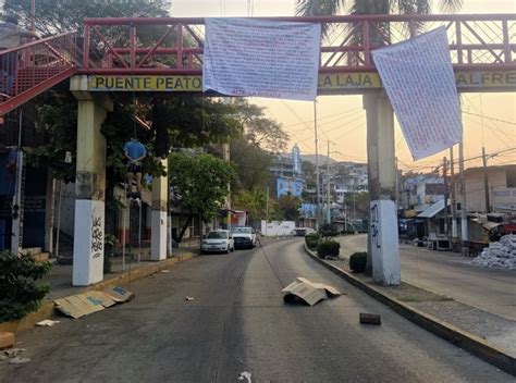 Ejecutan A Cuatro Hombres En La Laja A Uno Lo Cuelgan Del Puente