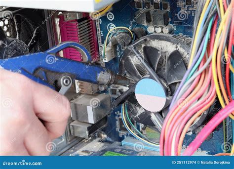 Cleaning The Inside Of A Computer With Compressed Air Maintenance And