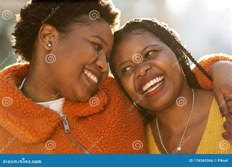 Two Beautiful Afro American Women In An Urban City Area Stock Photo