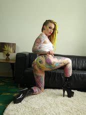 Inked Amateur Milf Loves To Show Her Sexy Figure Photos