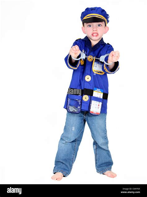 Young boy in police costume with handcuffs on white background Stock ...