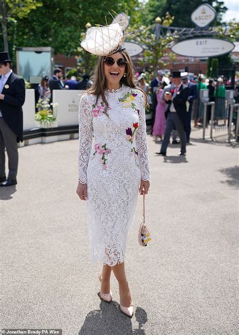Elizabeth Hurley Sends Temperatures Racing In A Skimpy Colourful Bikini As She Wishes Her