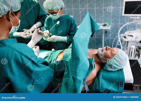 Surgery Team Operating in a Surgical Room Stock Image - Image of ...