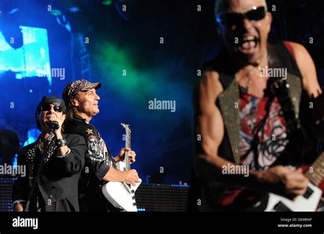 Singer Klaus Meine L And Guitarists Rudolf Schenker R And Matthias