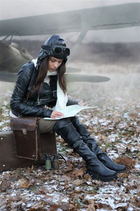 Portrait Of A Nice Brunette Girl In Retro Pilot Costume Stock Photo
