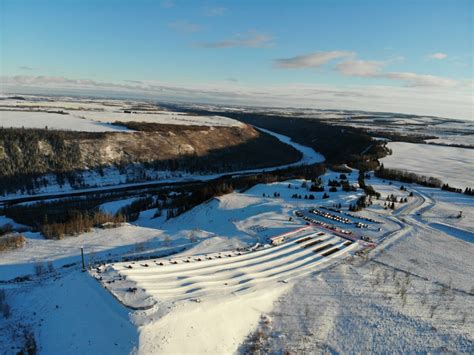 Night Glow Tubing: Slide Down Colourful Slopes of Red Deer’s Canyon Ski Resort This Winter