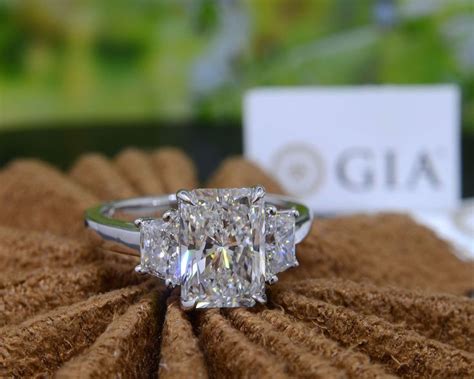 A Diamond Ring Sitting On Top Of A Table