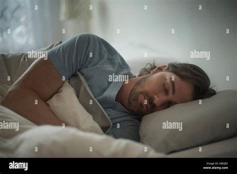 Man Sleeping Bed Night Hi Res Stock Photography And Images Alamy