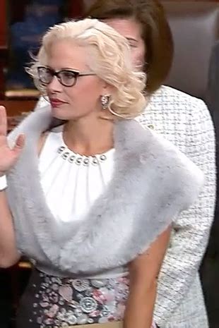 Kyrsten Sinema is not just a funky dresser, she's a fashion revolutionary.