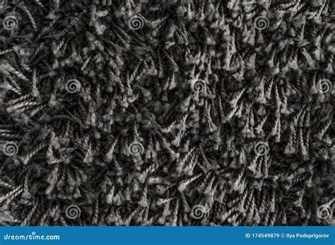 Black Shaggy Carpet Texture Rug With Short Wool Background Stock Image