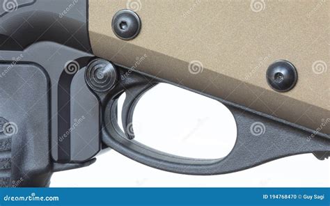 Trigger on a Bronze Colored Shotgun Stock Photo - Image of shooting ...