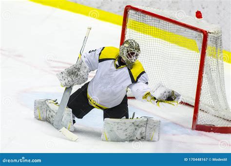 Ice Hockey Goalie Makes a Glove Save Stock Image - Image of goal ...