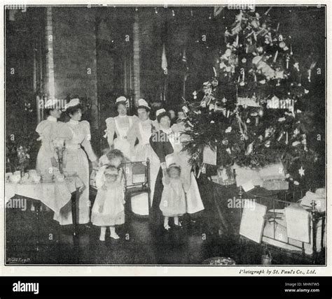 Nurses and sick Victorian children gathered around the enormous ...