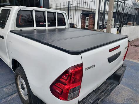 Tapa R Gida Spaco Trifold Toyota Hilux Dc Con Reja Proteccar