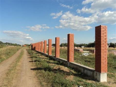 Кирпичные столбы для забора