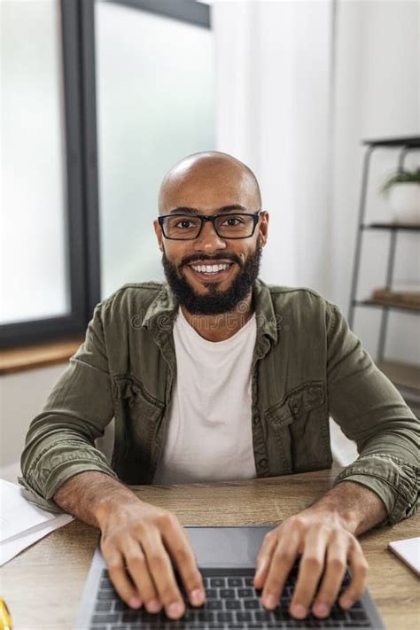 Positive Mature Male Freelancer Typing On Laptop And Looking At Screen Pov Shot Of Latin Man