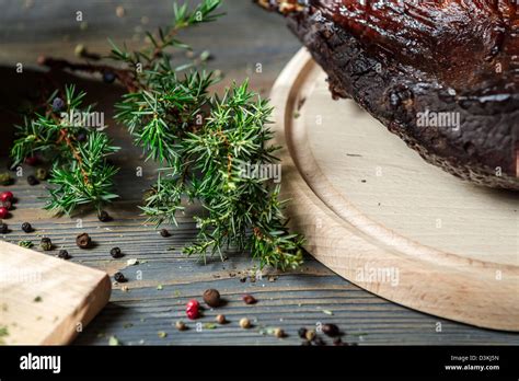 Closeup Of Juniper And Fresh Sliced Smoked Ham Stock Photo Alamy