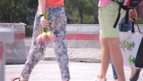 Short Jeans Couple Walking Street Voyeur Point Of View Outdoor Hot Summer Daylight Urban Scene