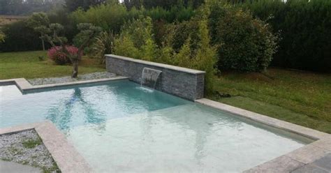 Une Piscine Avec Plage Un Espace Bien être Autour De Votre Piscine