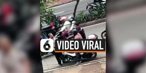 Video Viral Polisi Kenakan Seragam Ojol Hentikan Pengendara Motor