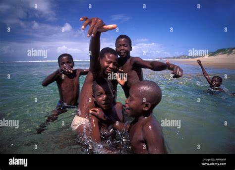 Southern Africa Mozambique Inhambane Tofo Beach Children playing in Stock Photo: 5441390 - Alamy