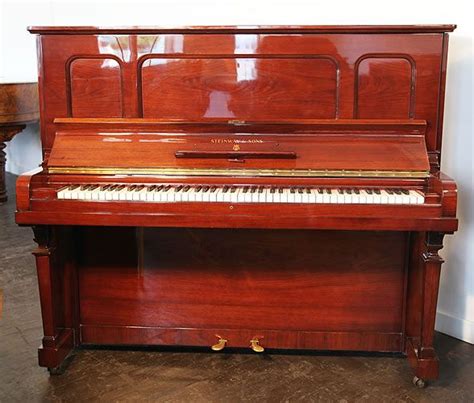 A Steinway Model K Vertegrand Upright Piano With A Mahogany Case