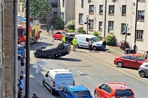 West Lothian Car Flipped Onto Roof In Busy High Street After Two