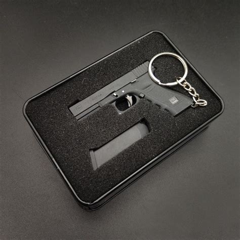 Arma Glock Pistola Brinquedo Desmontavel Chaveiro Shopee Brasil