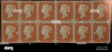 Bloc inutilisé de douze timbres poste Penny Red Brown de la reine