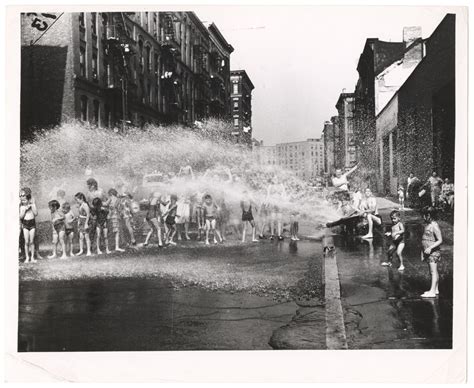 Children Playing In Water Sprayed From Open Fire Hydrant Lower East