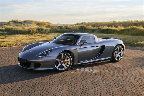 Porsche Carrera Gt Once Owned By F1 Champ Jenson Button Sells Just Shy