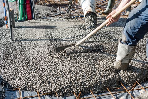 mixer truck pouring concrete on the construction site Stock Photo ...