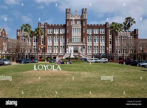 New Orleans Louisiana Loyola University Students Sitting On The Lawn